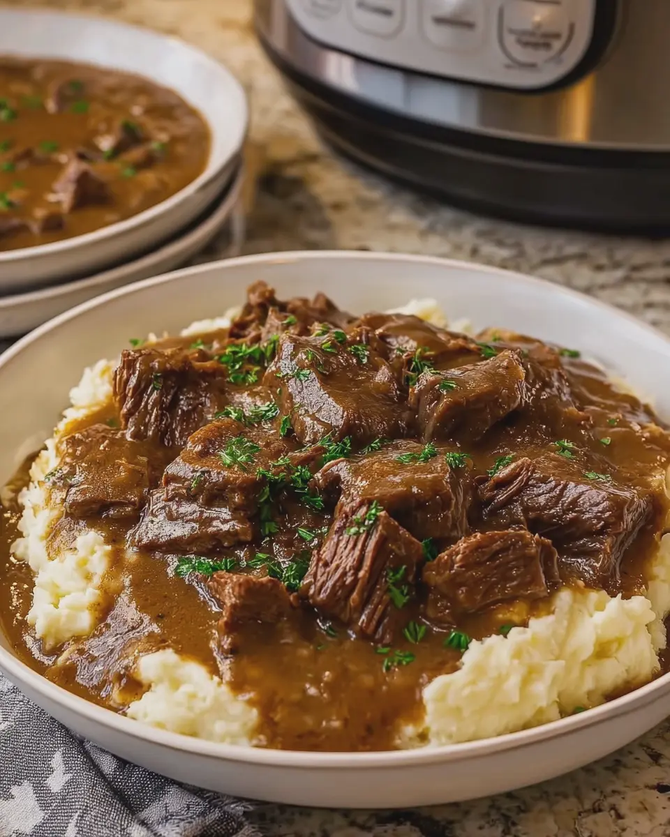Slow Cooker Beef and Gravy: The Best Comfort Over Mashed Potatoes